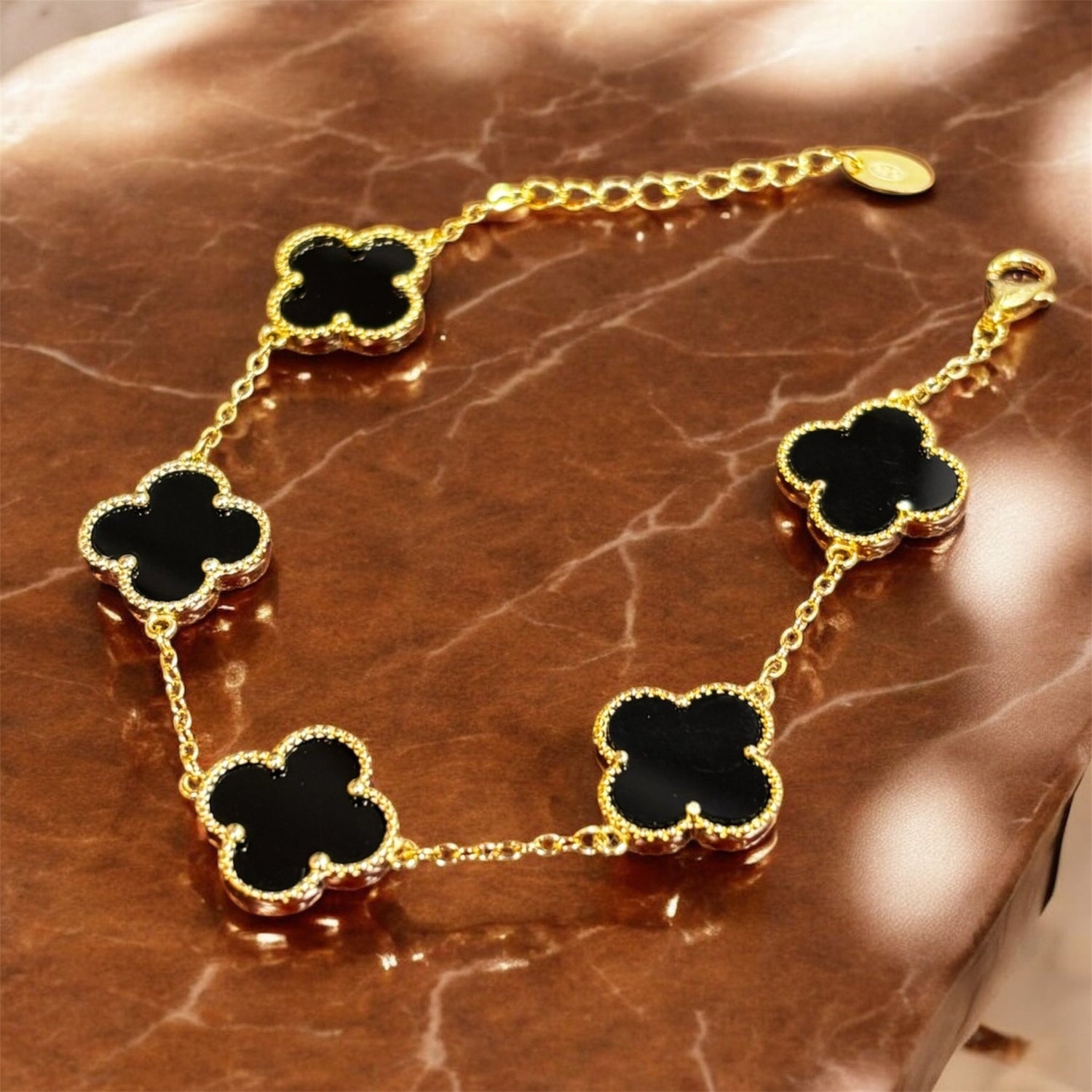 Bracciale quadrifoglio 5 fiori S dorato con onice in argento 925 - SIddharta
