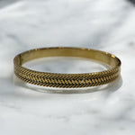 Bracciale rigido con treccia incisa in acciaio inossidabile dorato - SIddharta