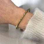 Bracciale rigido liscio in acciaio inossidabile dorato - SIddharta