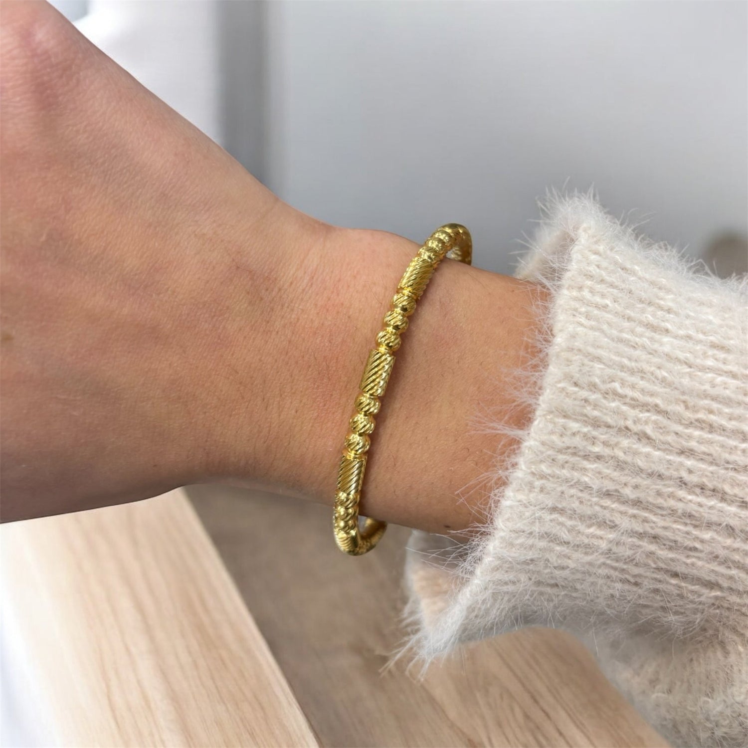 Bracciale rigido sfaccettato in acciaio inossidabile dorato - SIddharta